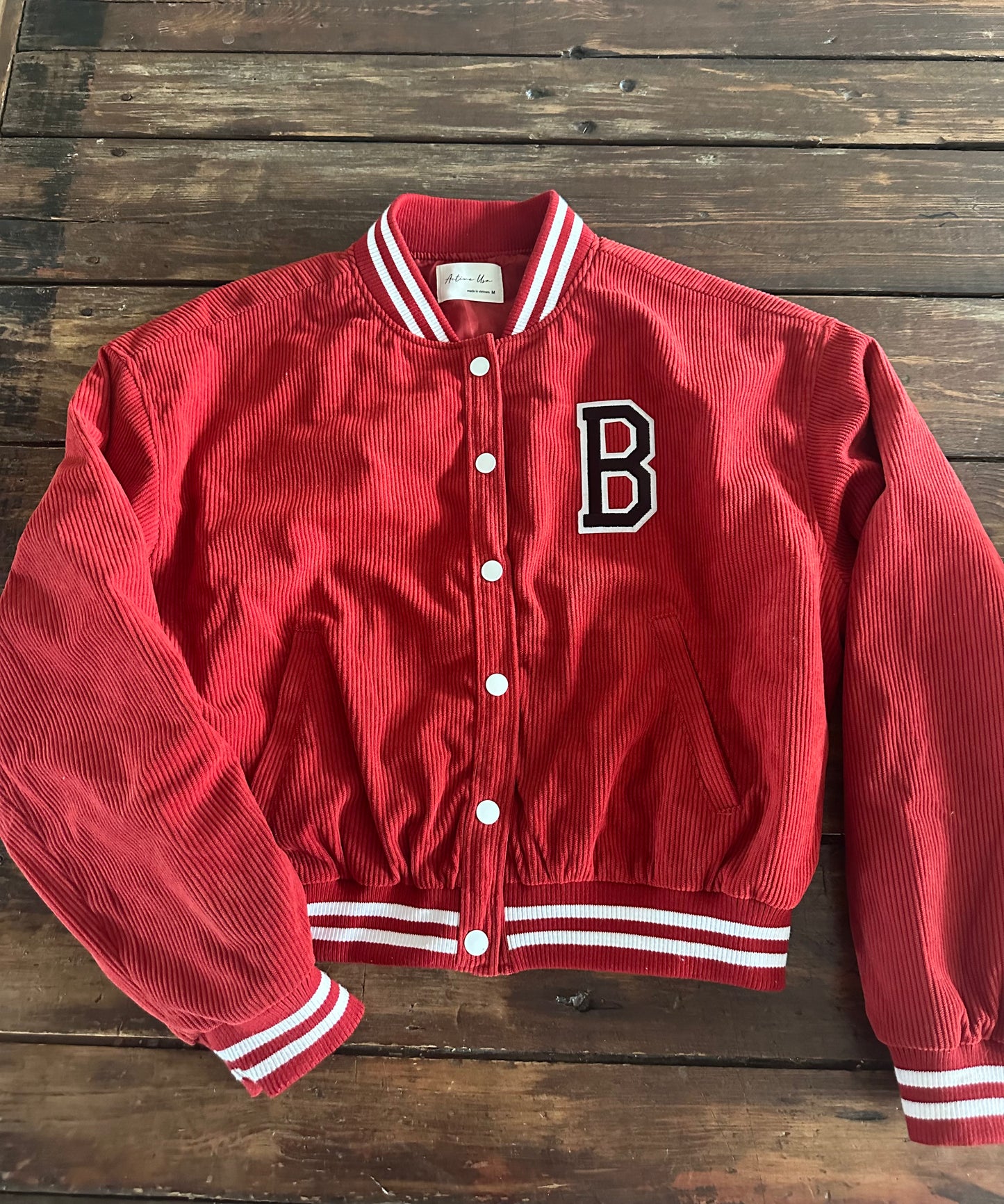 Ladies “varsity” jacket.